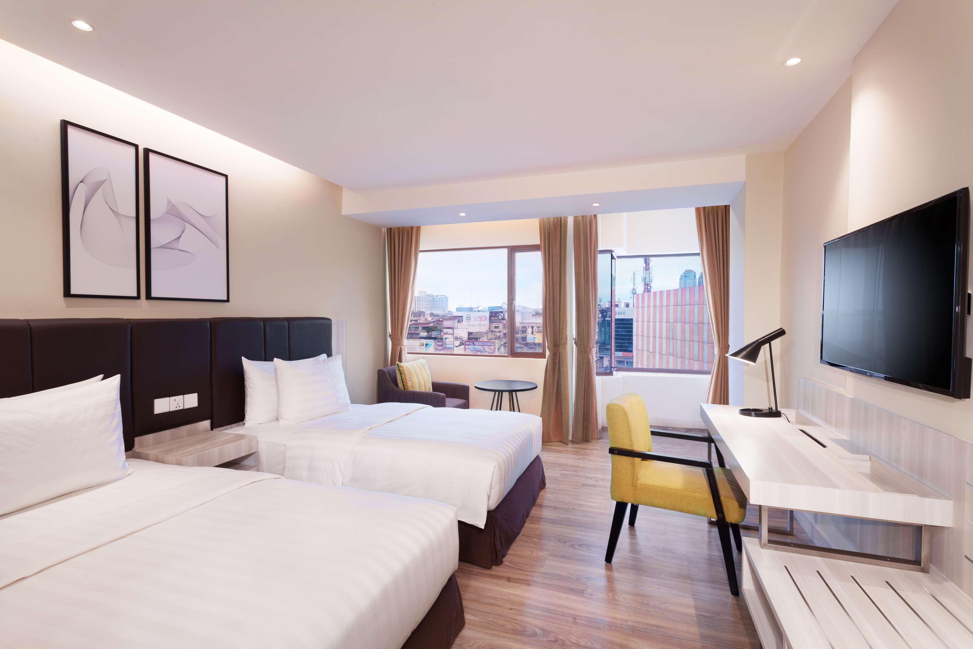 Aiho Hotel Medan Quarto foto